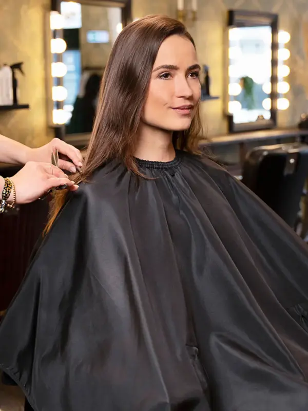 salon hairdresser’s cape with hand grips